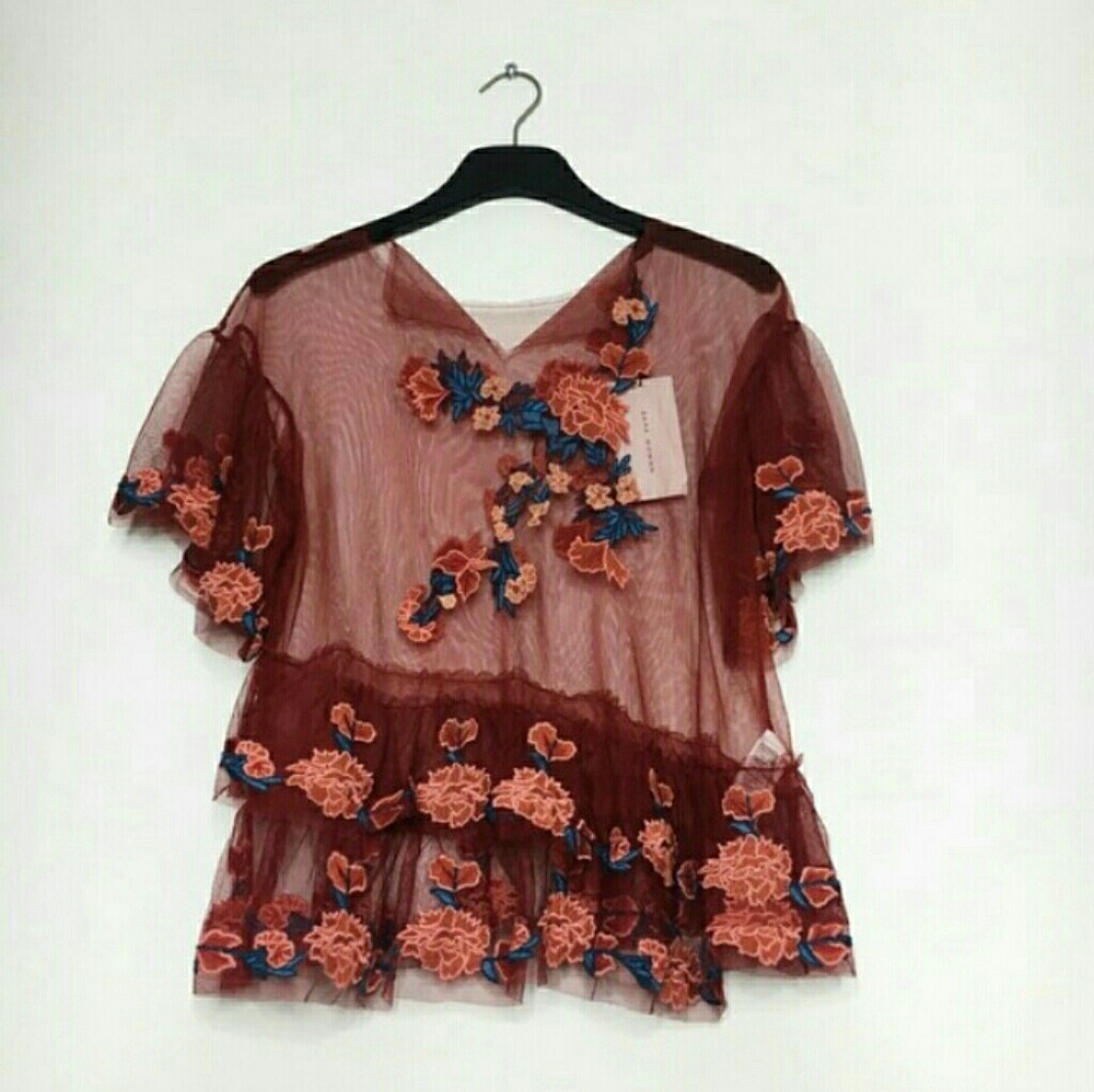 Zara's red floral sheer shirt